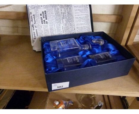 An R C Snelling 50th Anniversary commemorative decanter and shot glasses