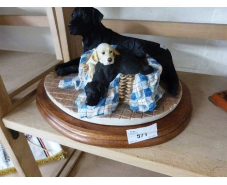 Resin model of a Labrador and pups