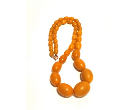 A beaded, graduated, light butterscotch Amber necklace. 47g.