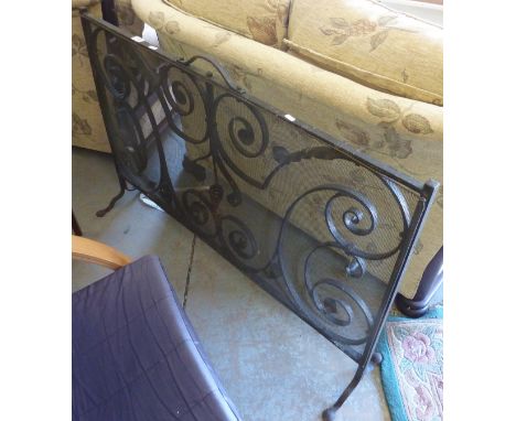Large wrought metal fire screen