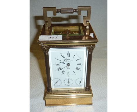 French carriage clock alarm with diary and date indicator in brass and bevelled glass case