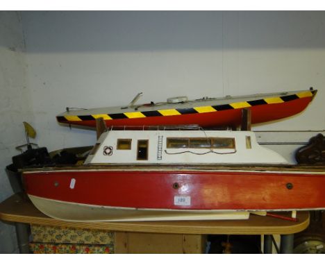 A model motor boat and a pond yacht.