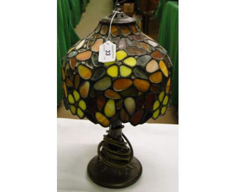 Table lamp with Tiffany style shade.