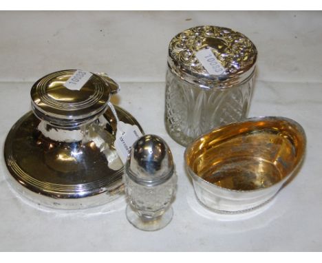 A Silver capstan inkwell, silver topped toilet jar, pepper etc