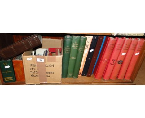 A shelf of albums of postage stamps, philately books, etc.