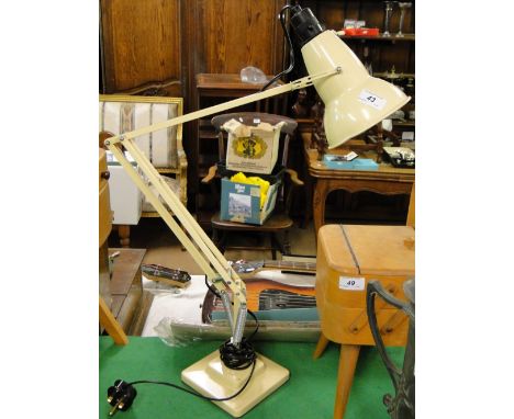 A Vintage cream angle-poise table lamp.