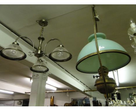 A Hanging oil lamp with green glass shade, a 3 branch ceiling light & a mahogany swing toilet mirror