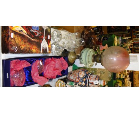 An oil lamp, crystal glassware, etc.