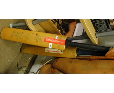 A Gray-Nicolls cricket bat signed by Worcester, Warwickshire and Hampshire 1978, and another.