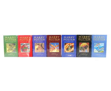 J.K. Rowling, A full set of the Deluxe Edition Harry Potter novels, 7 volumes, first deluxe editions, original cloth with mou