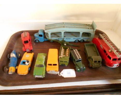 A selection of Dinky vehicles to include a fire engine, Bedford van, Ferrari, Austin Healey, car transporter etc