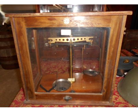 An early 20th C mahogany cased Townson and Merser Ltd apothecary scales  