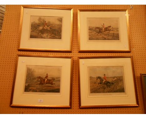 A set of four hunting engravings with hand coloured detail