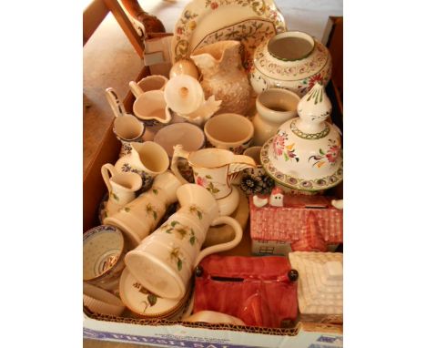 A box of miscellaneous ceramics to include a graduated set of Nelson Pottery jugs, a Royal Worcester 'Blue Sprays' cream jug,