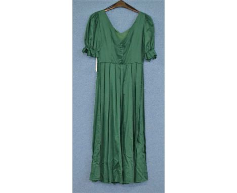 A c.1980's Laura Ashley green cotton dress, with V-neck, short sleeves with bow detail, v-back button fastening, 3/4 length, 