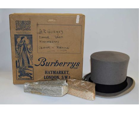 A vintage Burberry top hat (a/f) together with two ladies evening bags, (3)