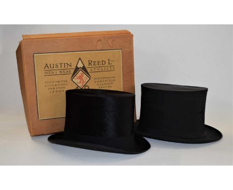 A black silk top hat by Dunn &amp; Co, London, boxed by Austin Reed, together with a collapsible top hat by Seymour, ParisInt