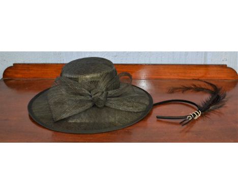 A black straw hat by First Avenue and a feather and diamante fascinator, (2)