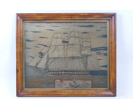 Victorian School, mid 19th Century, a mariner's woolwork tapestry picture of a three masted clipper flying the red ensign, an