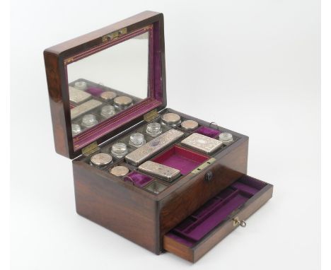 Victorian rosewood vanity box, circa 1850-70, with fitted interior with electroplated topped bottles and jars and further gla