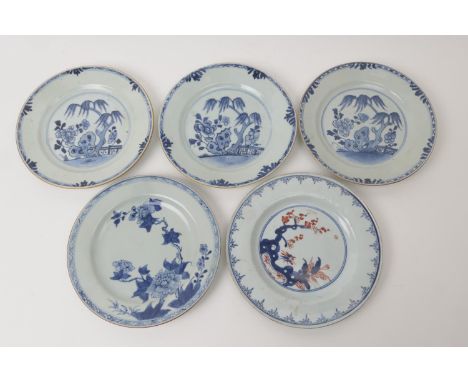 Five Chinese blue and white plates, Kangxi and later (all restored), 22.5-23.5cm diameter 
