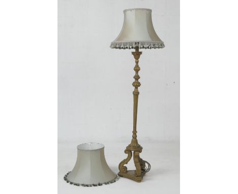 Italian style gilt moulded standard lamp, with sage green silk shade, and a spare shade, over a carved and fluted column and 