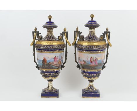 Pair of French Ormolu mounted vases in the Sevres style, late 19th Century, each with a waisted neck and domed cover, ovoid b