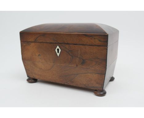 Regency rosewood sarcophagus tea caddy, circa 1810-20, interior with twin covers, boxwood line inlays, squat bun feet, 21cm x