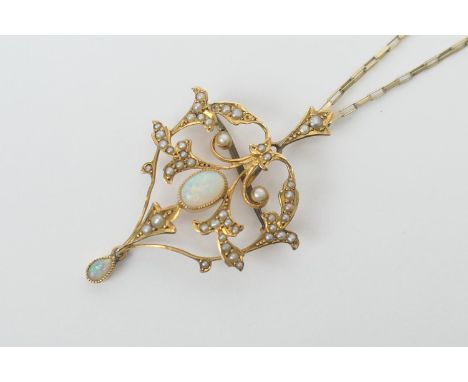 9ct gold opal and seed pearl openwork pendant, 45mm drop, width 30mm, suspended from a 9ct gold fine block link chain, length