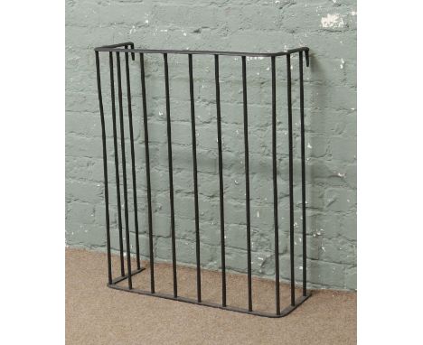 An iron nursery fire fender.