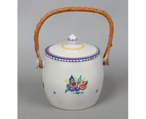 A Poole pottery biscuit barrel and cover with swing handle.