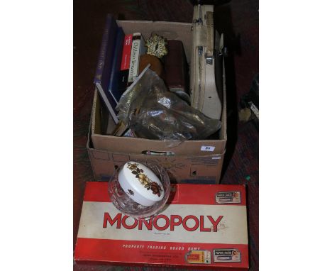 A box of vintage collectables including a Monopoly board game, cuckoo clock, a cased Diplomat Super typewriter, Royal Ephemer