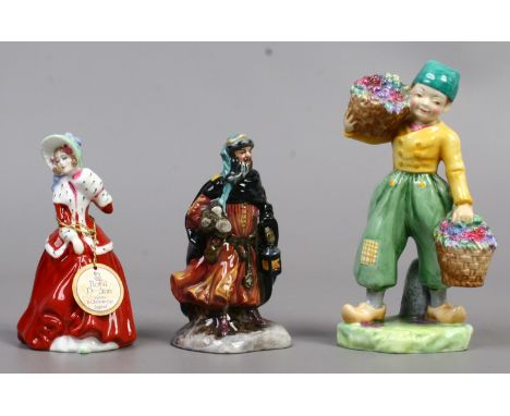 A Royal Worcester figure Dutch Boy {AF} along with two Royal Doulton figures Good King Wenceslas HN3262 and Christmas Morn HN