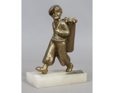 An Austrian Art Deco table lighter by Josef Lorenzi. Modelled in the form of a young boy golf caddy and raised on an alabaste