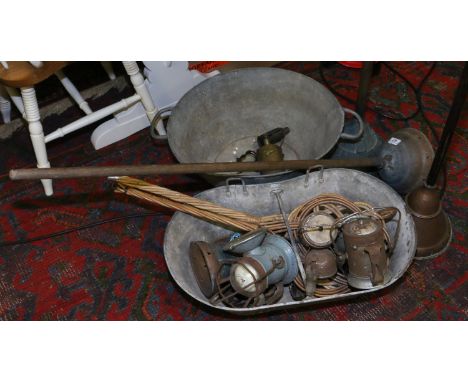 A group of vintage collectables including galvanized troughs, possers, lamps, carpet beaters etc.