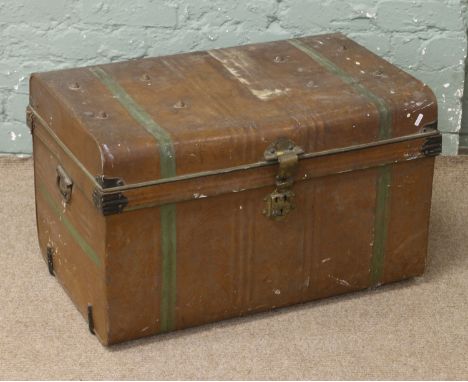 A vintage tin travelling trunk.