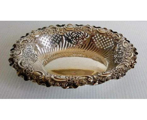 A Victorian silver pierced oval bon-bon dish with elaborate rococo decoration by Fenton Brothers, Sheffield, 1895, 20 x 16 cm