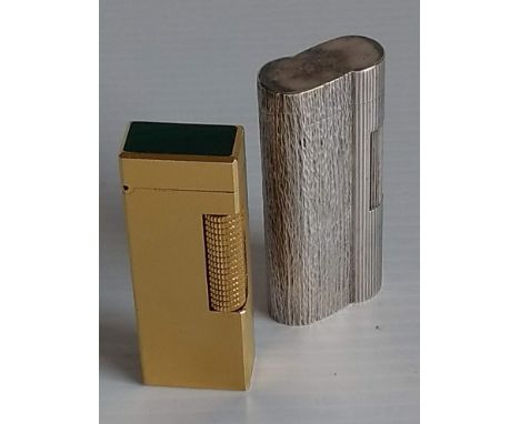A vintage gold plated Dunhill rollagas lighter with malachite top, engine turned design and a vintage Dunhill silver tone rol