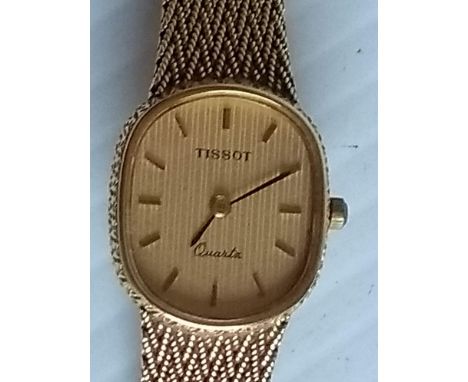 A vintage Tissot ladies quartz dress watch with baton markers on an 18k yellow gold mesh strap in original box, Helvetia Swis