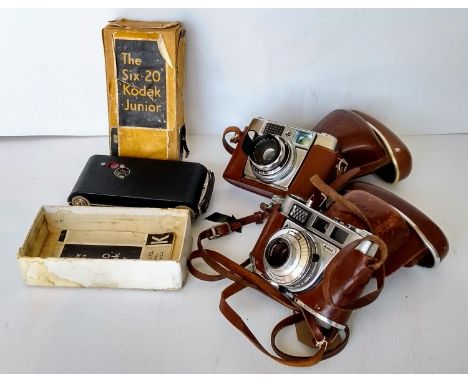 A boxed Kodak Six-20 Junior camera, Kodak Retinette IB and a vintage Agfa Optima camera (3) 