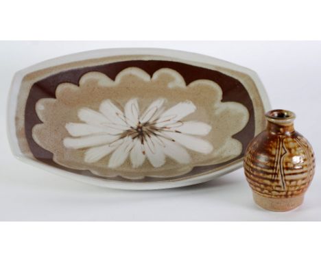 TWO PIECES OF STUDIO POTTERY, Comprising; an oblong, shallow DISH, by Marianne De Tray, decorated in tones of brown with a st