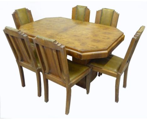 ART DECO STYLE BUR-WALNUT VENEER EXTENDING DINING TABLE WITH TWO ADDITIONAL LEAVES AND EIGHT CLOSE STUDDED LEATHER DINING CHA