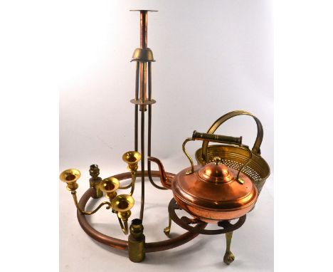 Copper and brass ceiling light, brass candelabra, pierced brass basket, brass trivet stand with a small copper kettle