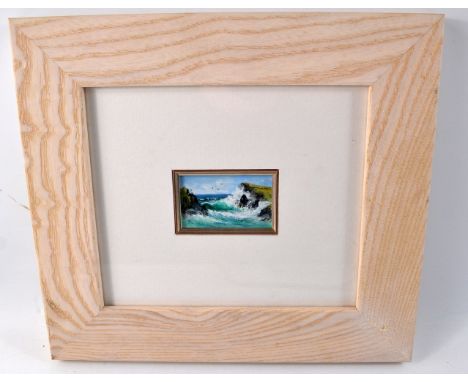 Joan Stirling framed oil of seascape. Frame 28 by 25cm