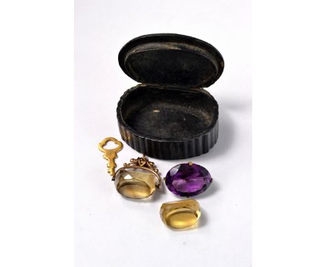 3 Scottish Highland style fob gem stones, one with 375 Hallmarked mount in a vintage papermache snuff box