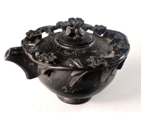 Late 19th Century Black teapot with flower design. 10cm including spout and 7cm including finial