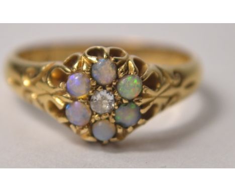18ct ladies opal and diamond floral set ring size K, 3g gross weight