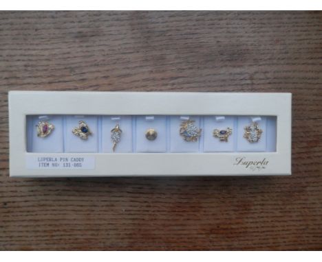 Luperla pin caddy containing six gold plated  animal pins and a spare in decorated with enamel, crystals and rhinestones.