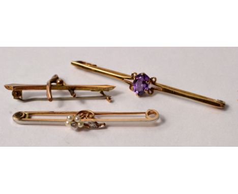 Three bar brooches to include 375 oval set amethyst with scroll work to sides (6cm wide), stamped 9ct wishbone design (4cm wi