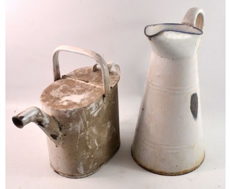 White enamelled vintage watering can 28cm x 35cm across at widest points and a vintage enamelled water jug 32cm H approx 